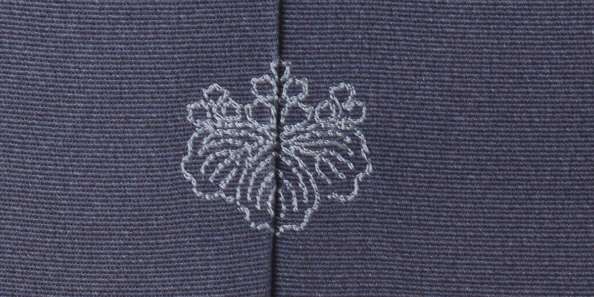 色留袖［タンクブルーに七宝模様］