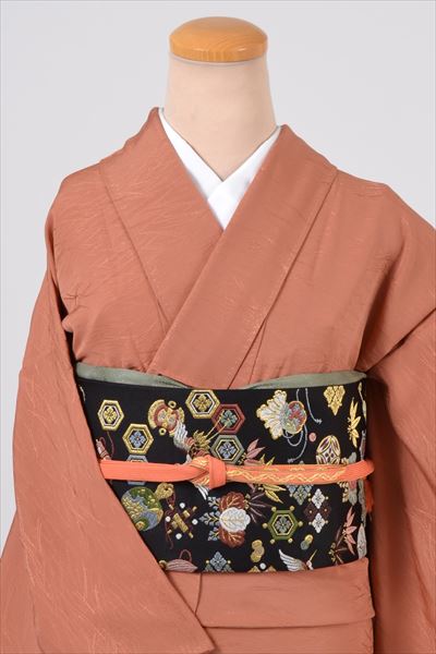 色無地［洗い朱地の松葉地紋］